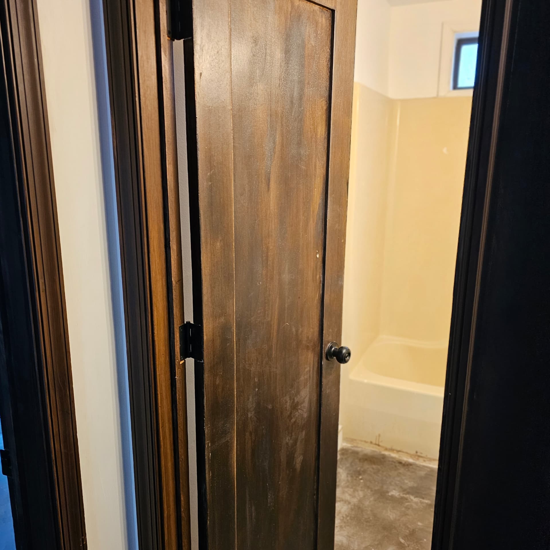 Finished stained door installed
